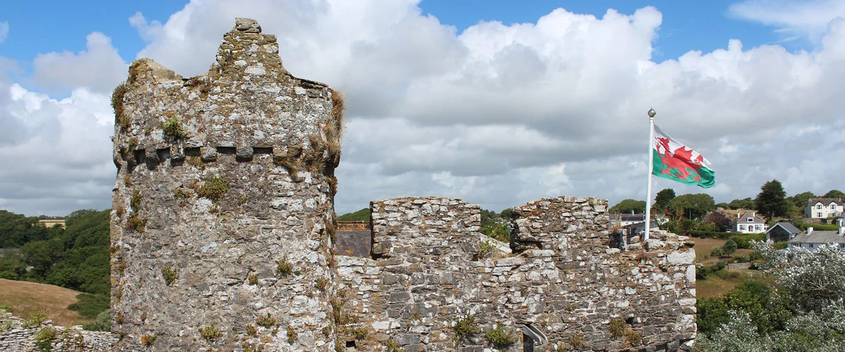 Welsh castle with national flag
